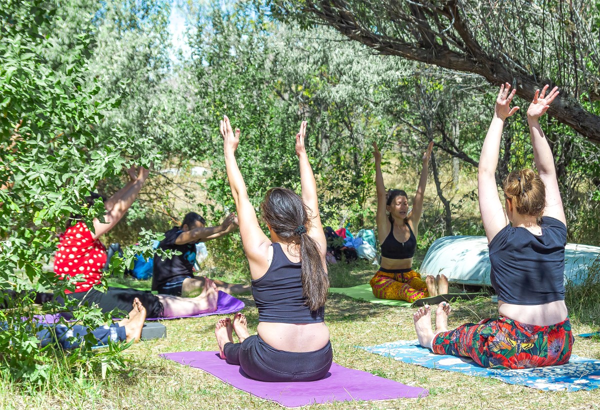 group-people-doing-yoga-exercise-park-womans-relaxing-park.jpg
